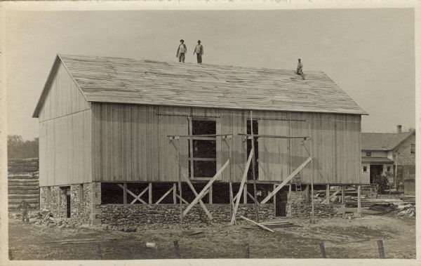 Wooden building under construction, highlighting architectural preservation.