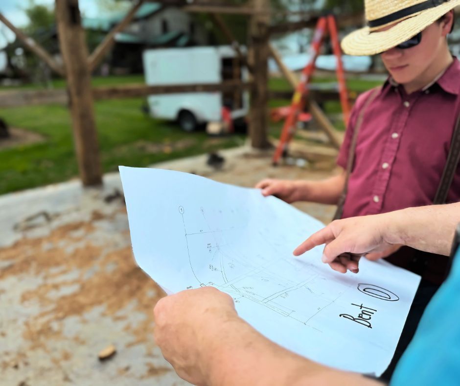 Custom design elements reviewed by builders in Pennsylvania as they study architectural blueprints.
