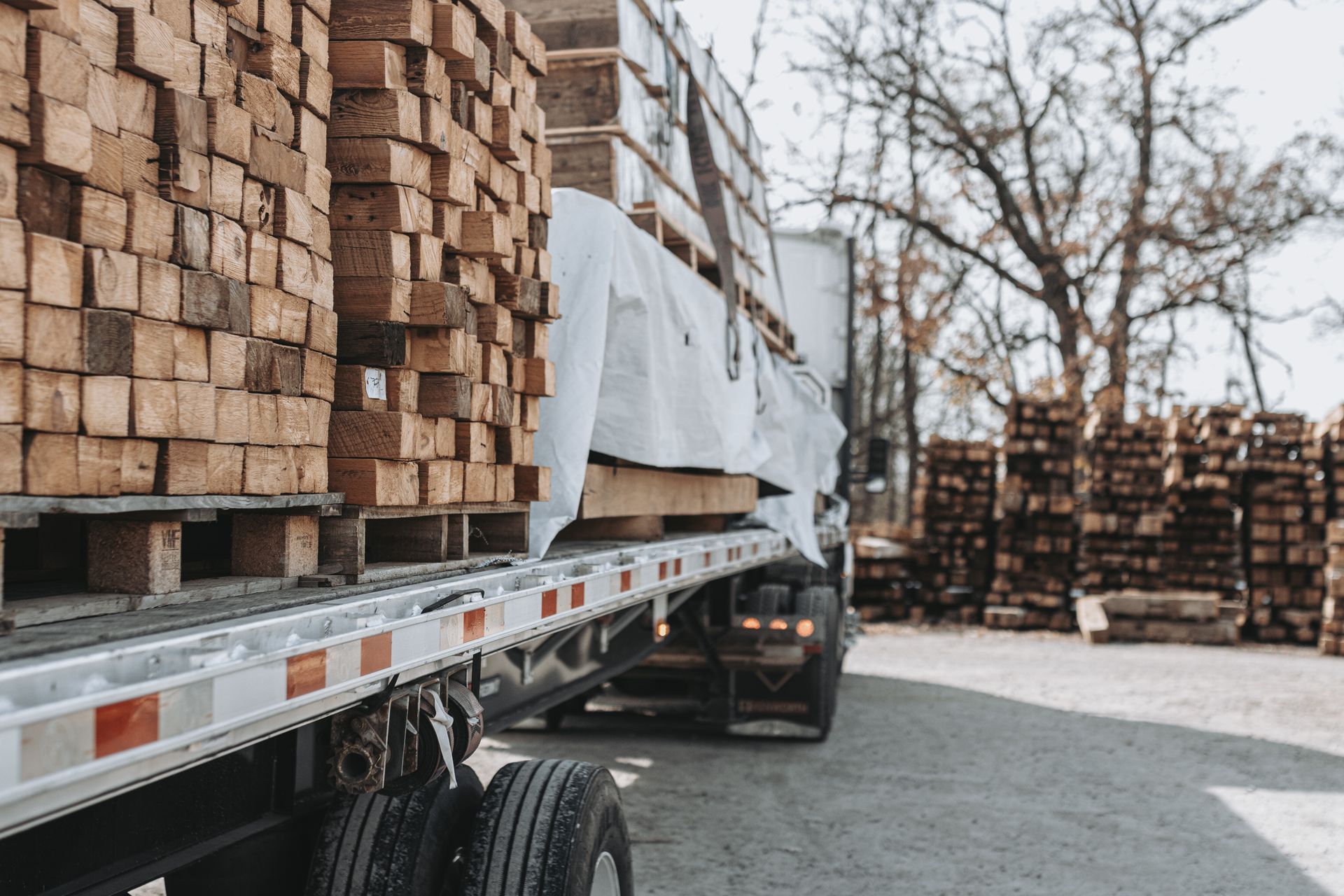 Flatbed truck with lumber in Pennsylvania for construction use.