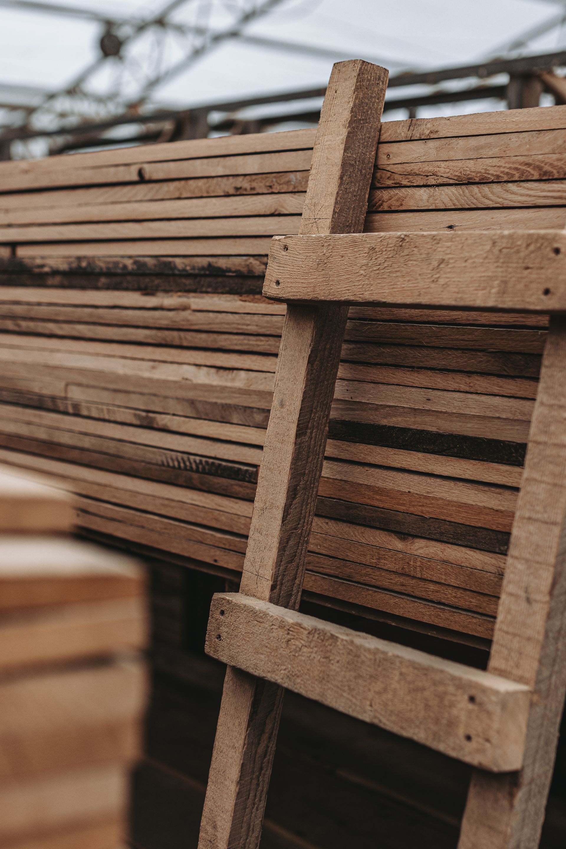 A stack of glue laminated beams in a Pennsylvania storage facility prepared for construction use.