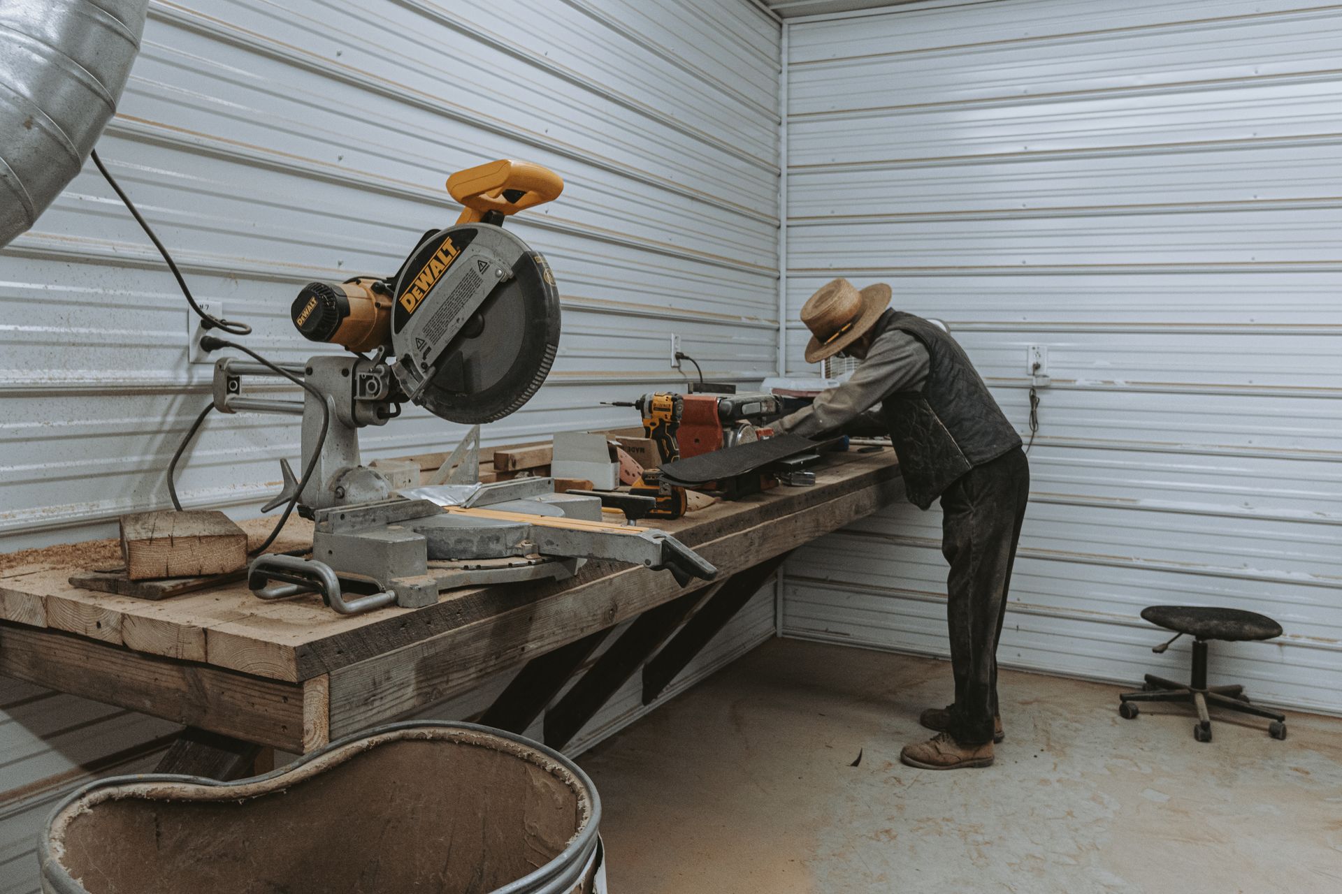 Woodworker using butterfly keys on a workbench.