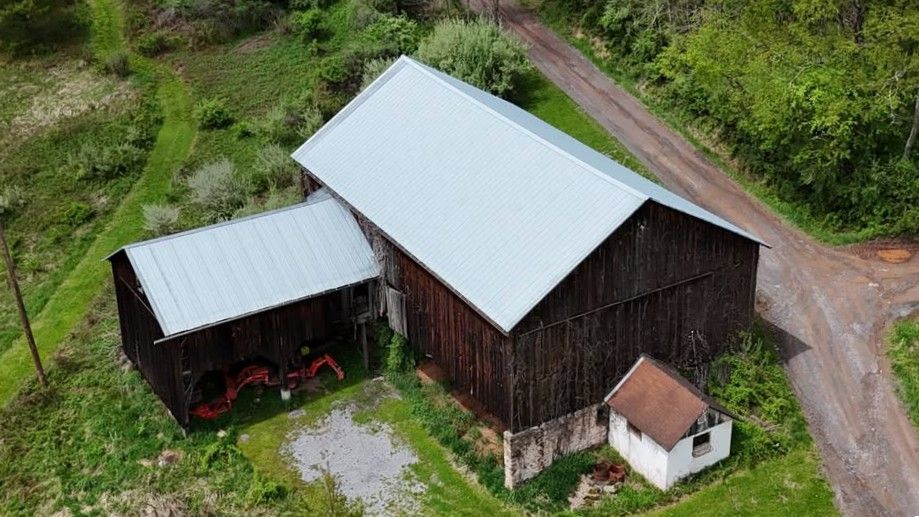 Aerial view of a rustic wooden barn in Pennsylvania, offering perfect inspiration for modern barn ki