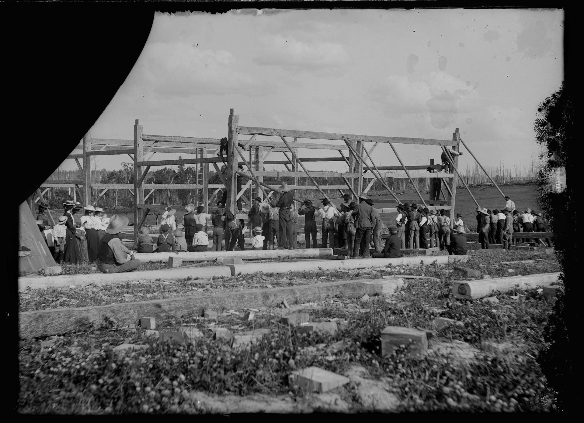 Community participating in barn construction during a historic Pennsylvania barn raising