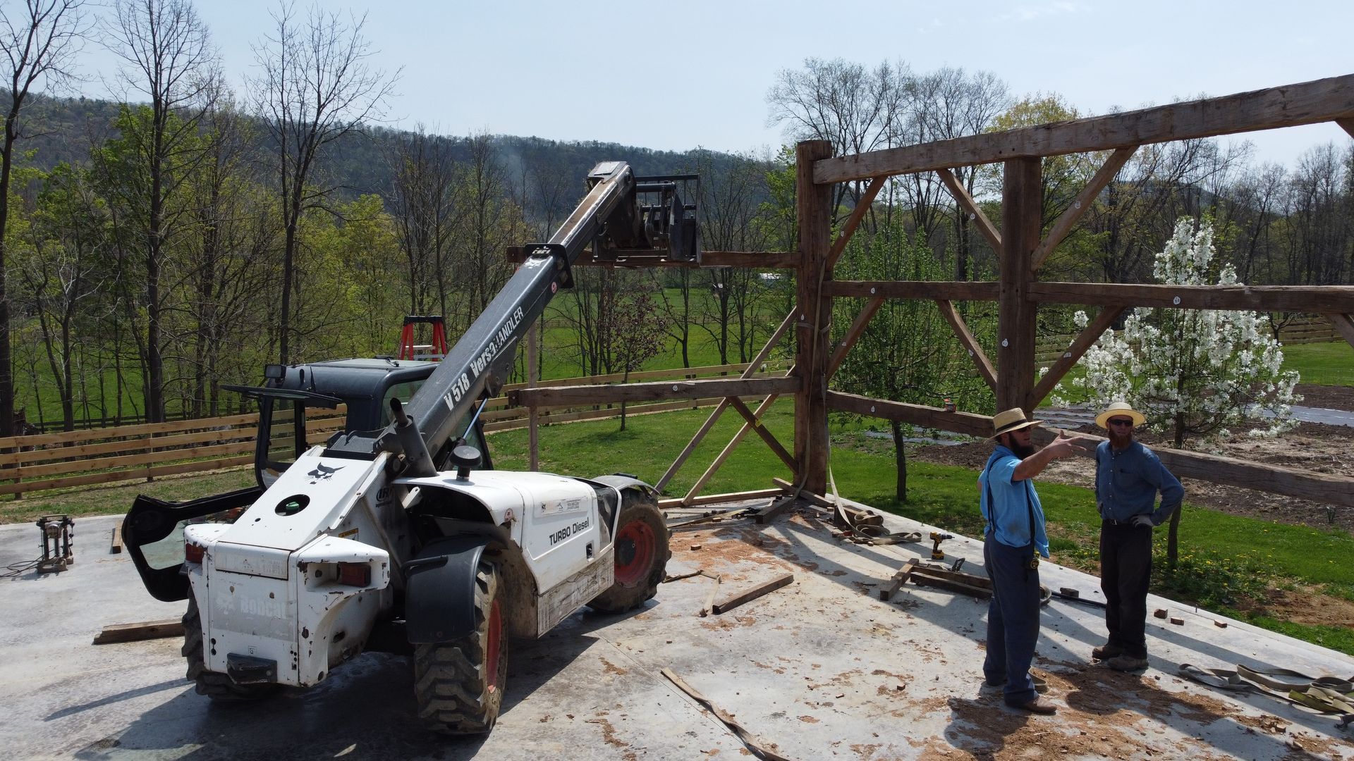 Three barn conversion architects at work on a rustic project.