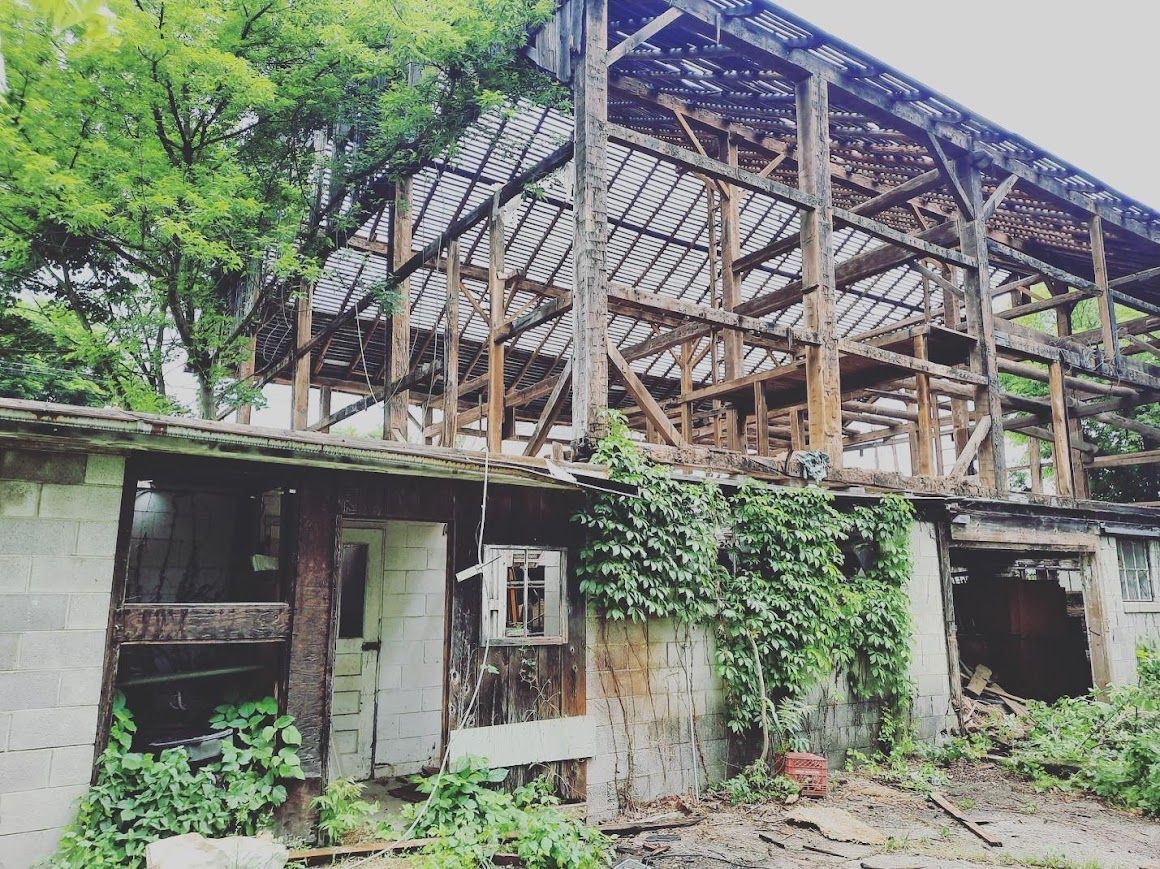 Wooden and concrete structure for heritage home restoration.