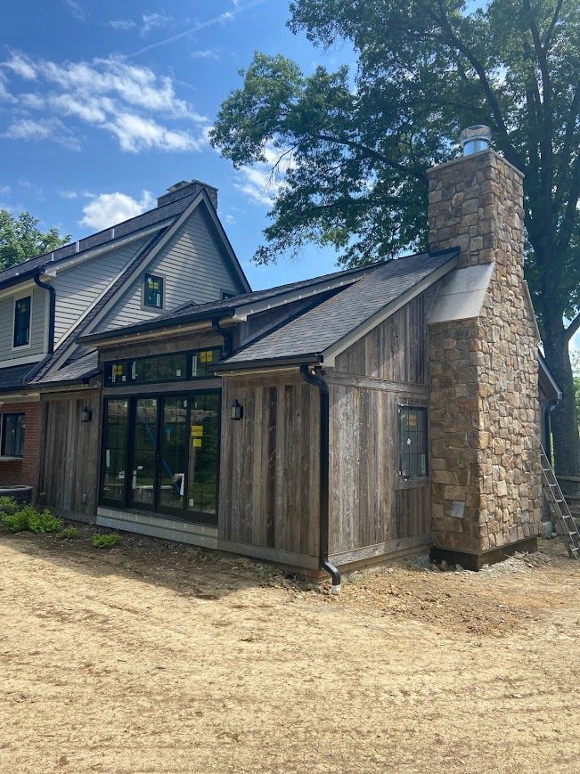 Barn to House conversion with antique reclaimed lumber 