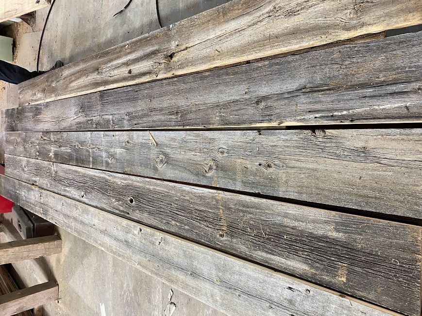 Weathered wooden planks for historic timber frames.