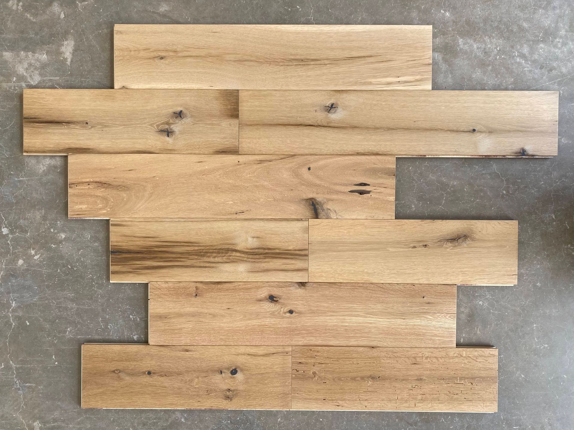 Wood lamination on floor boards over concrete.