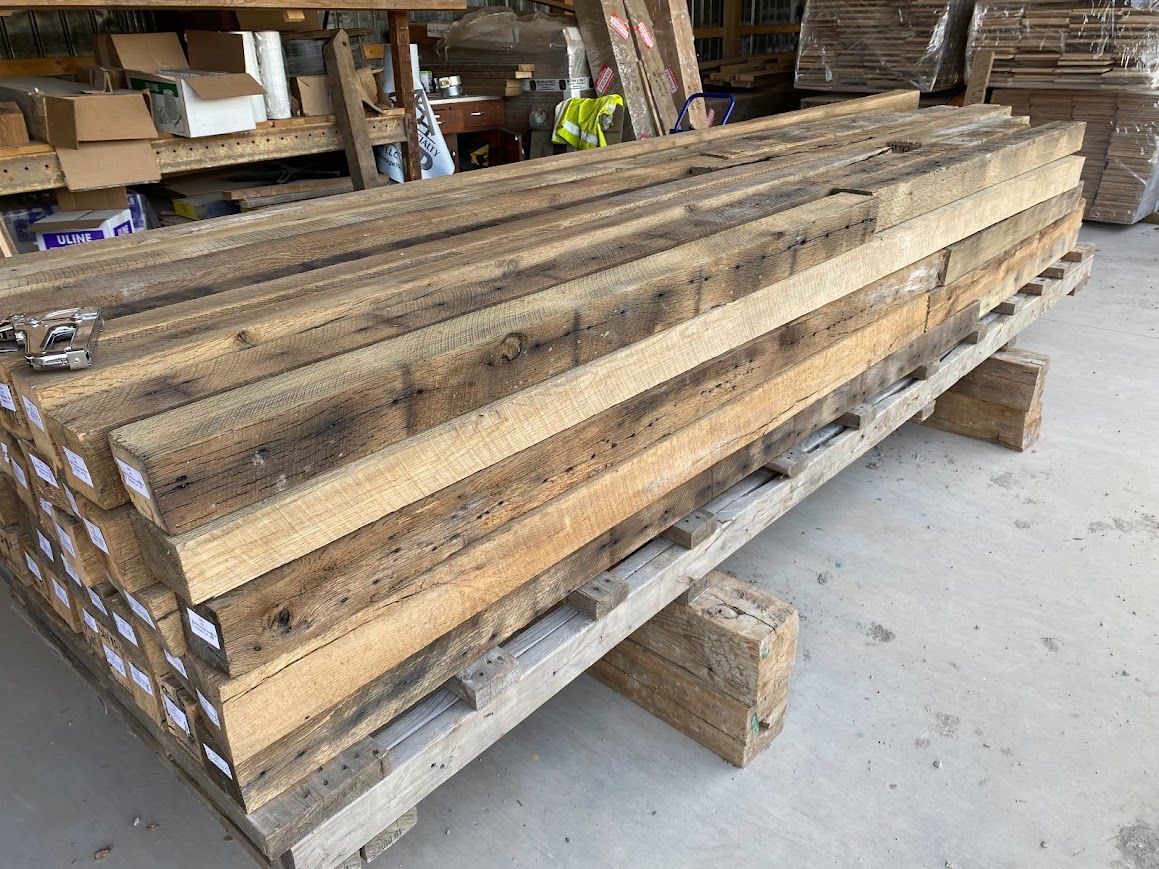 Stack of reclaimed wood columns on a pallet in Pennsylvania.
