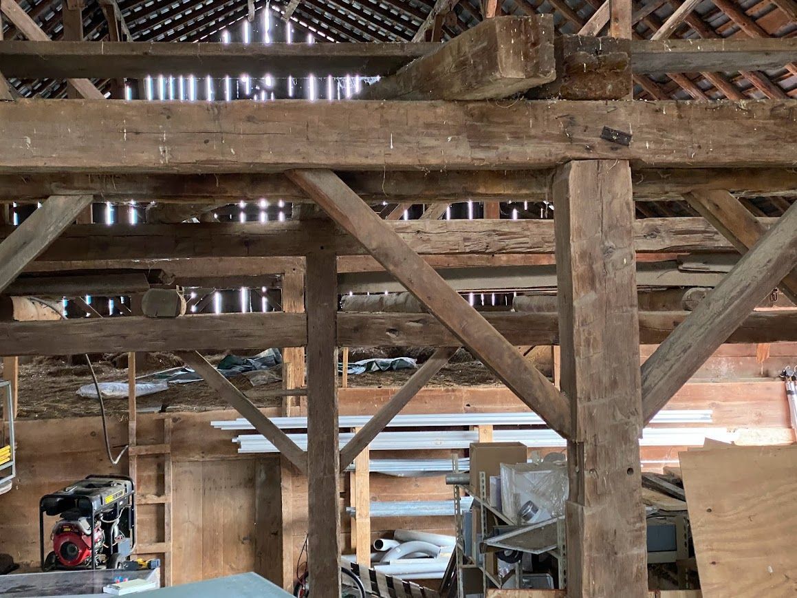 Rustic wooden beams showcasing traditional carpentry with butt joints.