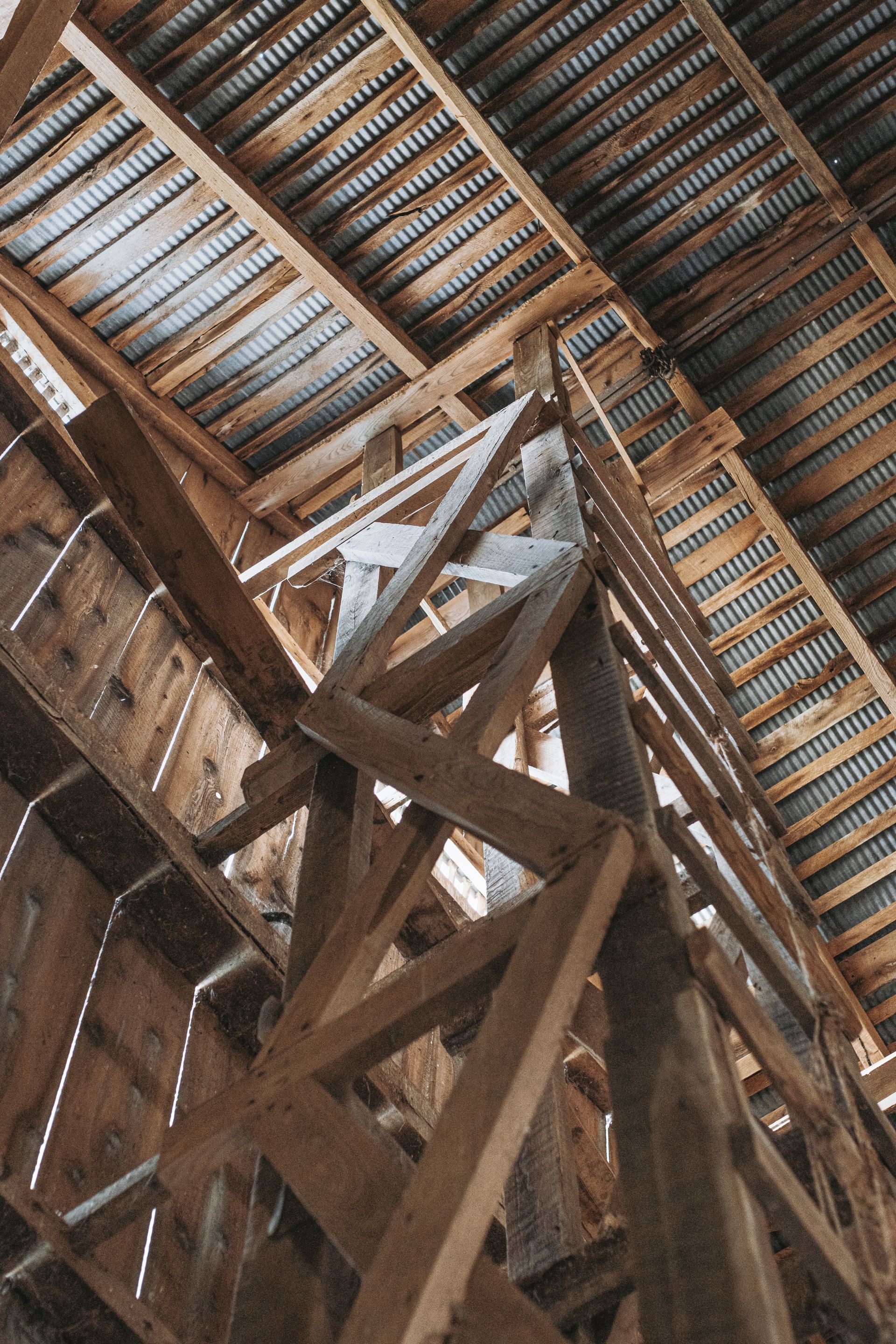 Build a home with a heritage 100 year old barn frame