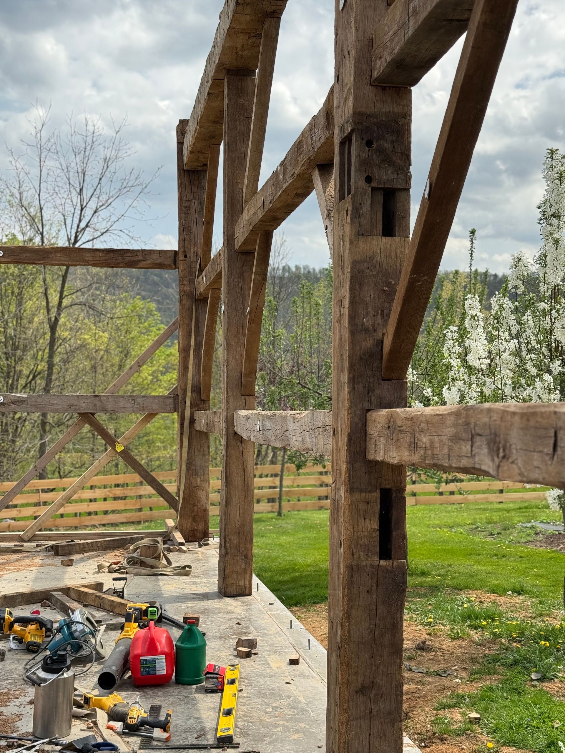 Close-up of timber frame joinery during barn construction in Pennsylvania