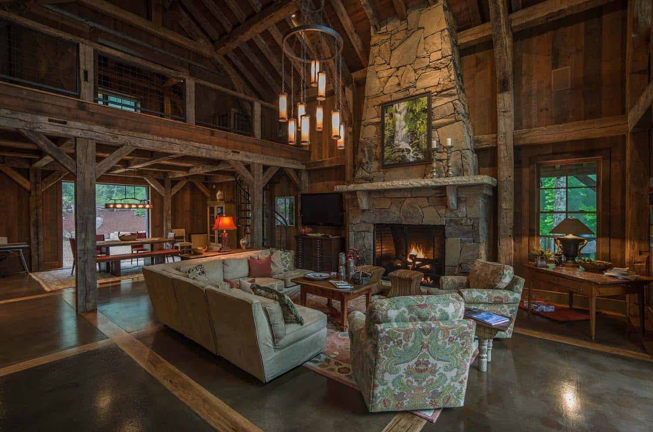 Rustic living room with housebarn design elements.