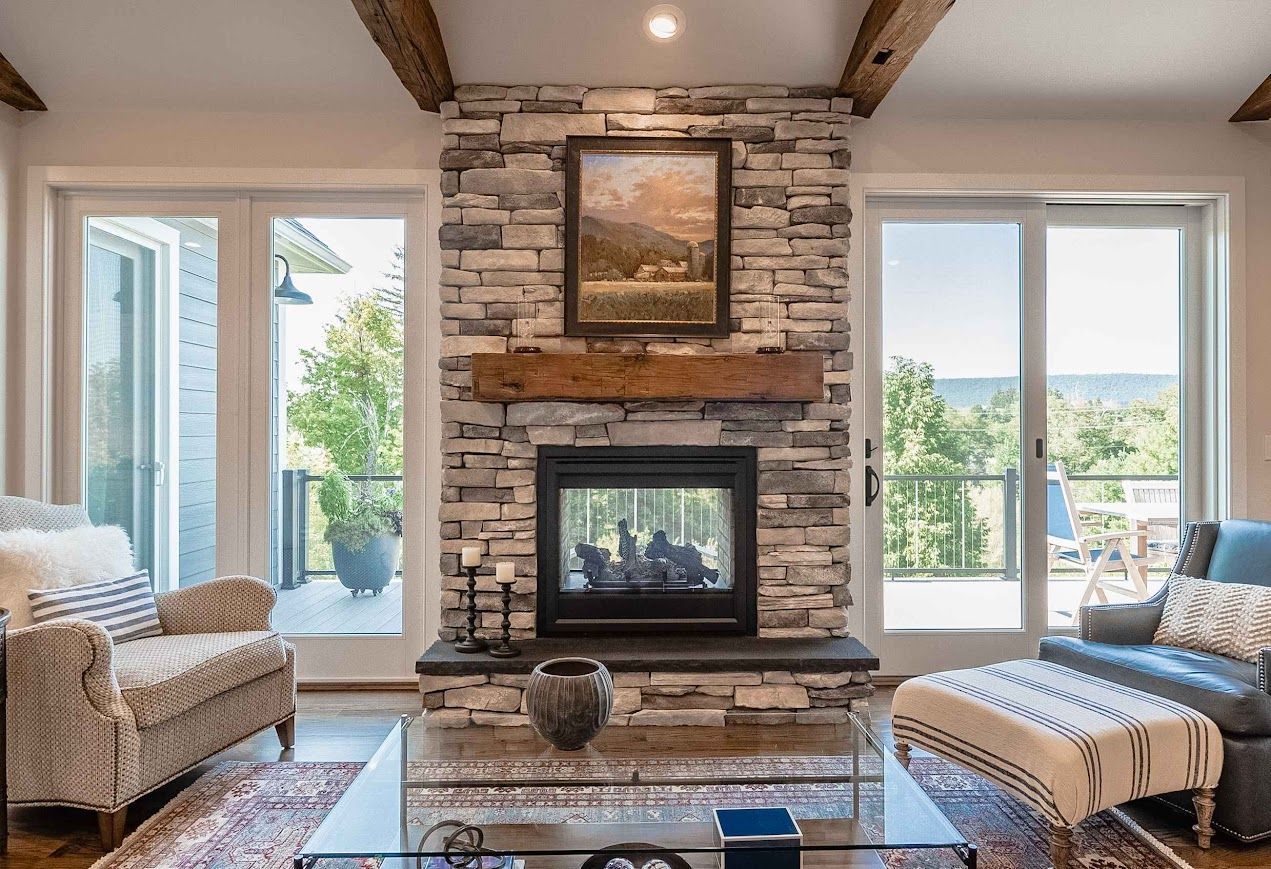 Living Room with Stone Fireplace and Reclaimed Wood Mantel in Pennsylvania