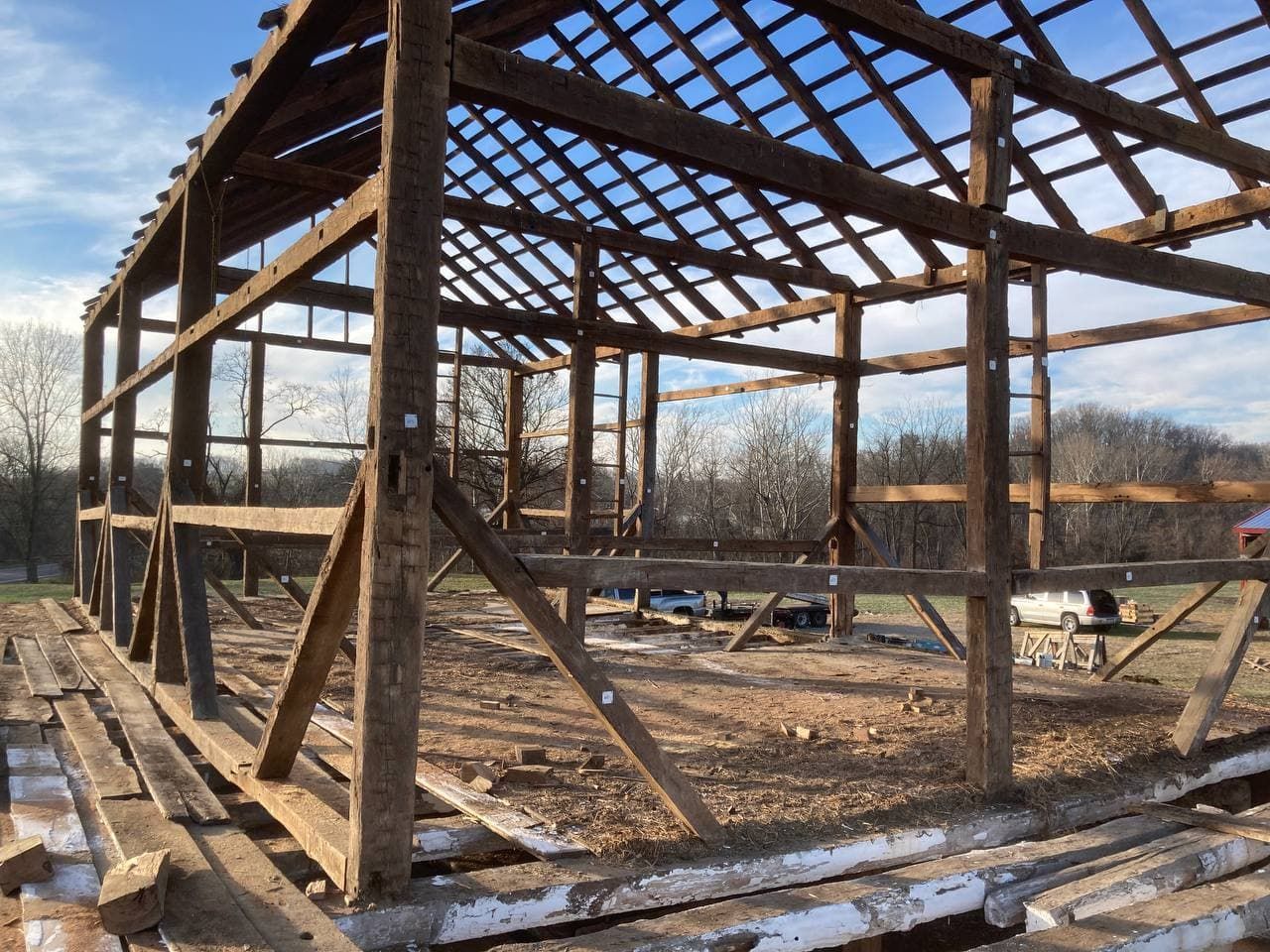 Wooden framework under construction, highlighting timber frame home cost.
