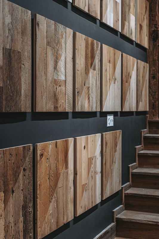 Wall panels and stairs crafted from reclaimed timber architecture.