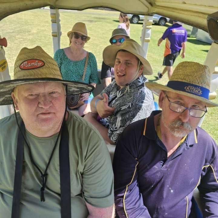 Group of People Wearing Hats Enjoying Sunny Day Outdoors -Comfort N Care Support QLD PTY LTD.