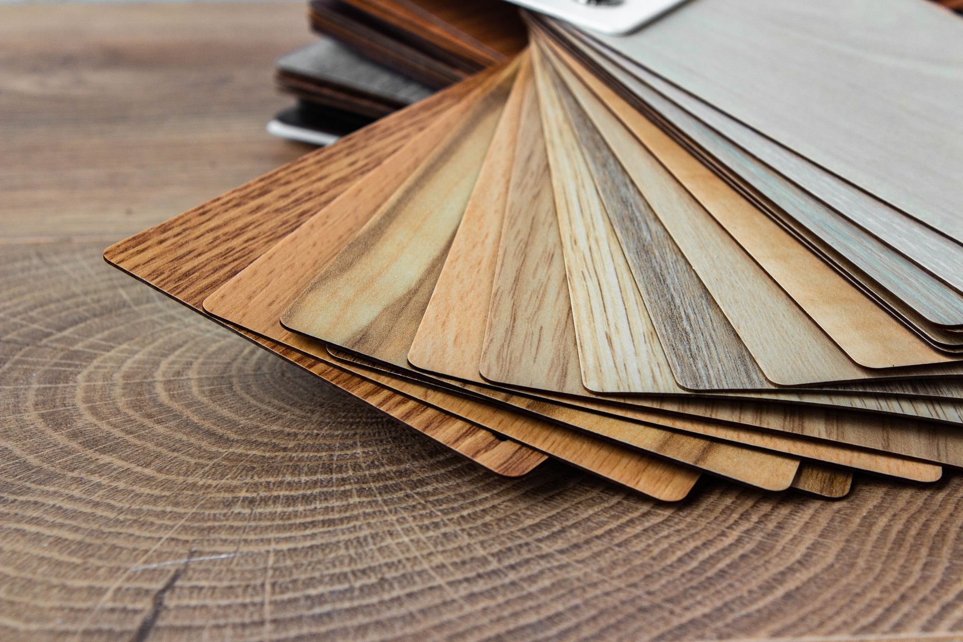A stack of wooden samples on a wooden table.