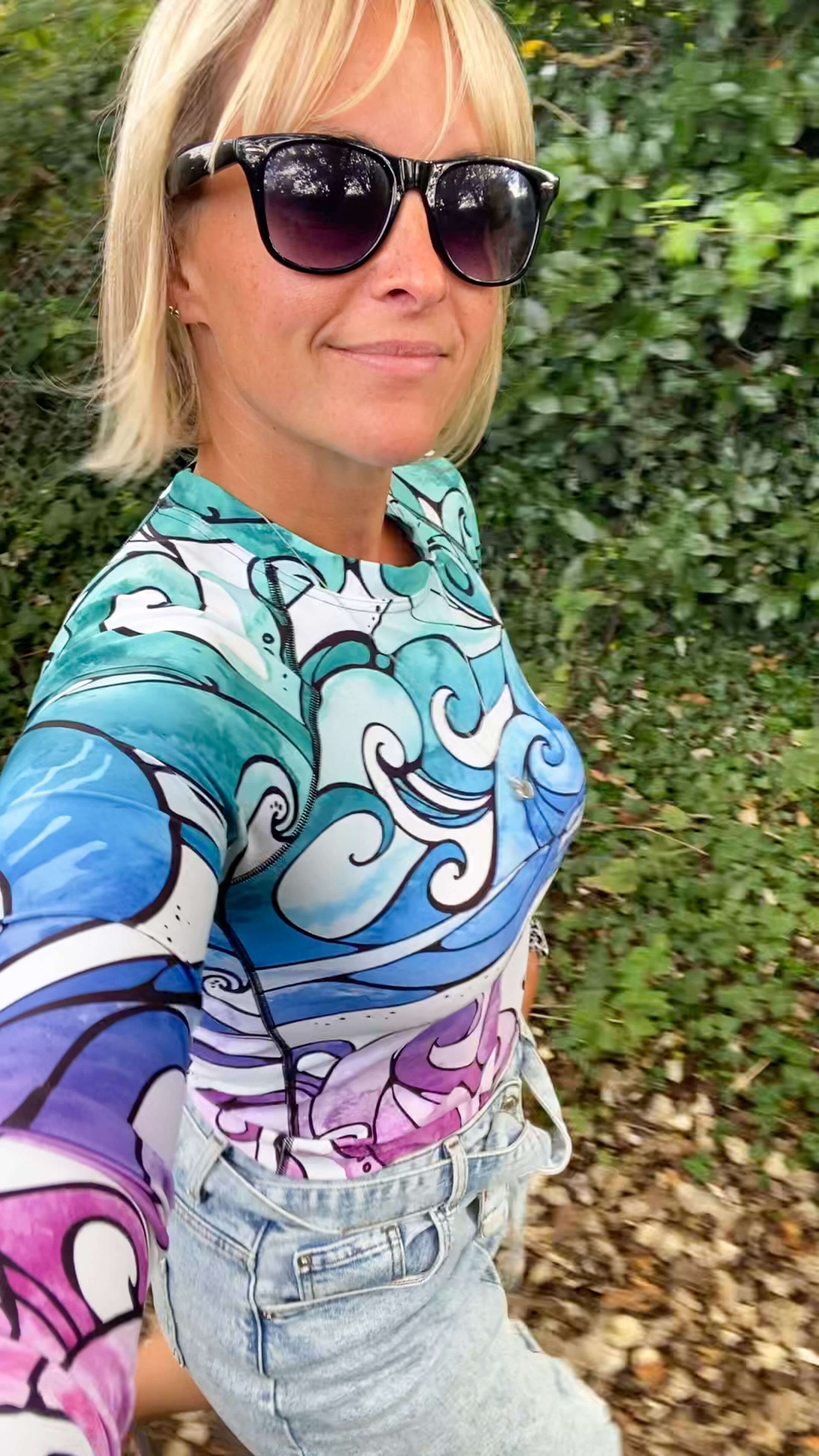 Wearing a rash guard vest with normal clothes, modelled by Michelle Lott and designed by MooksGoo