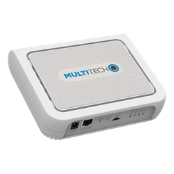 White MultiTech cellular router with a light gray top panel.