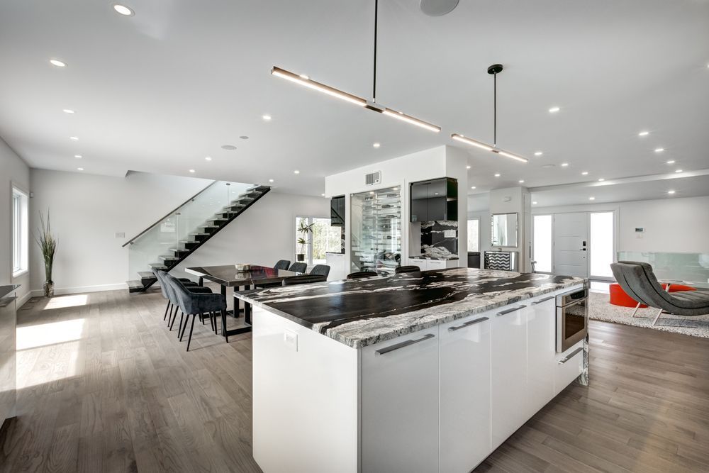 A kitchen with a large island in the middle of the room.