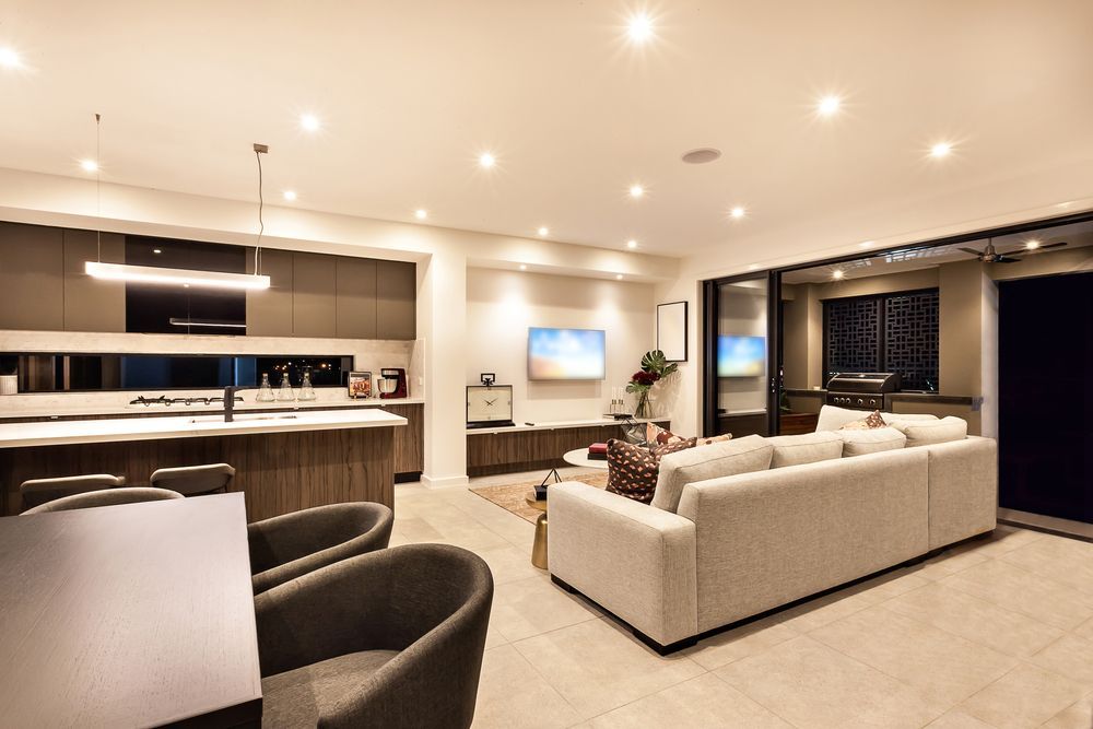 A kitchen with a large island in the middle of the room.