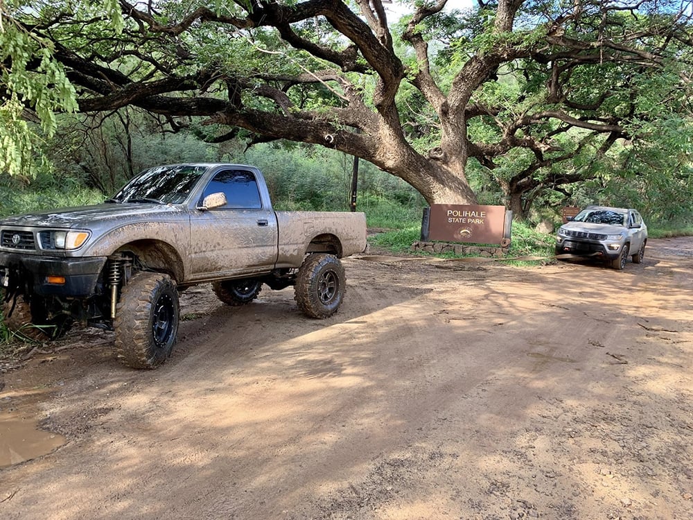 truck pulling out a stuck vehicle