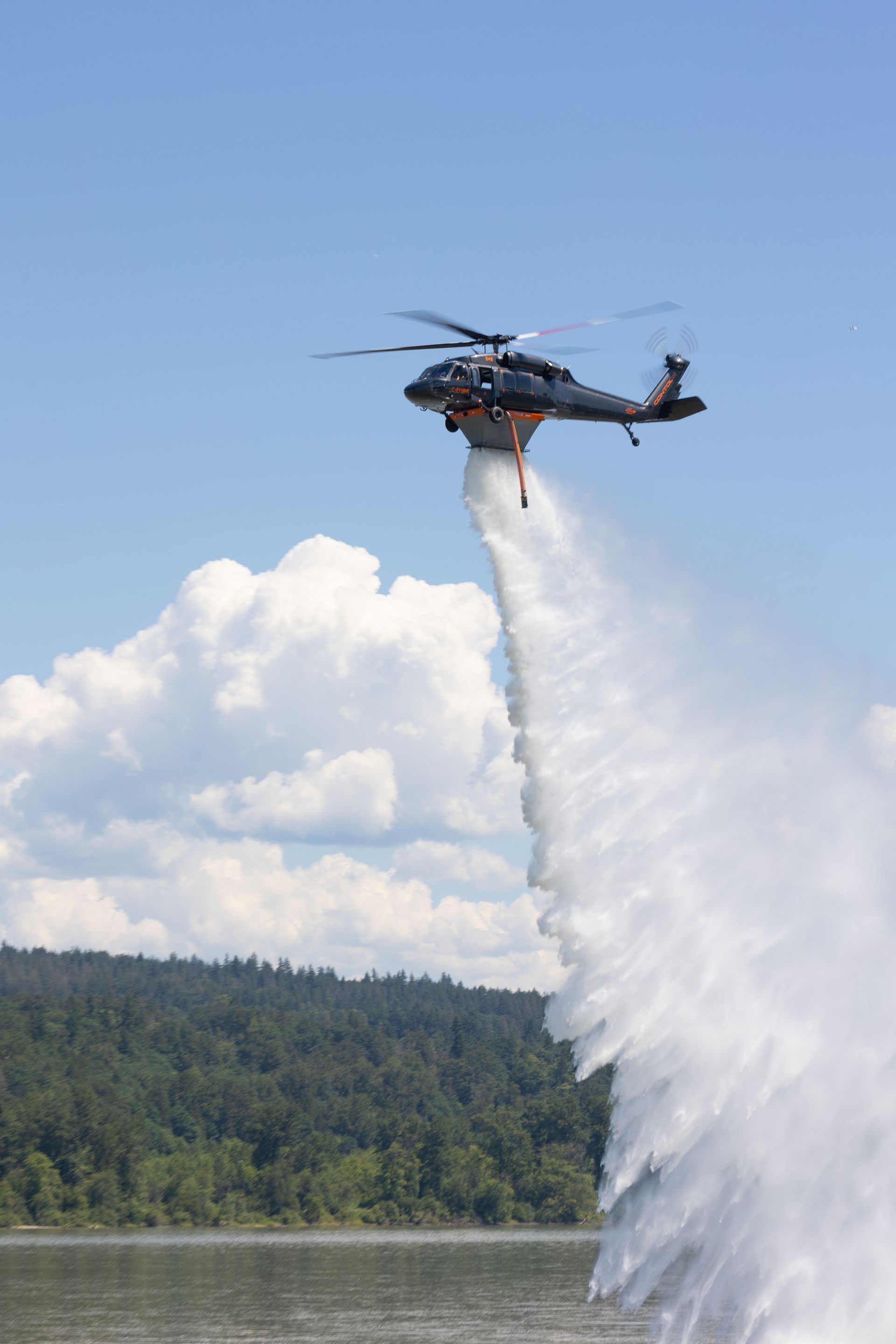 black hawk throwing water