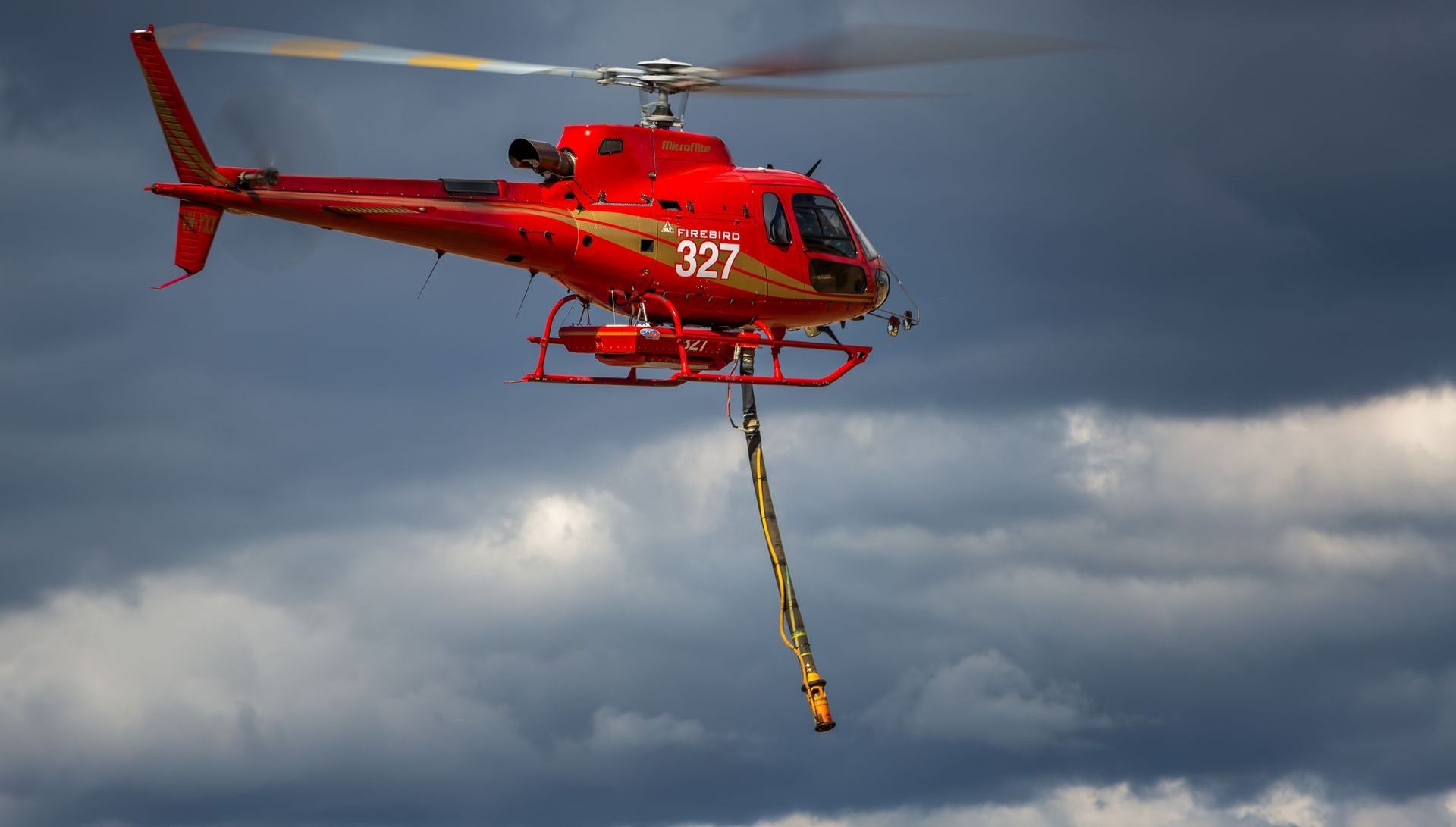 Firefighting helicopter with Helitak tank 