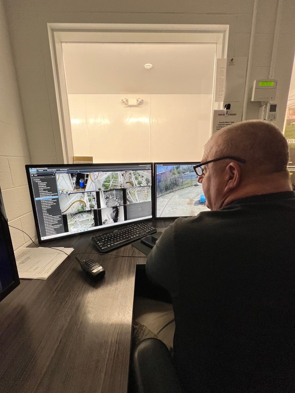 security officer monitoring security cameras