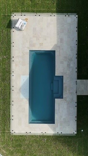  A Swimming Pool in The Middle of A Lush Green Field — Billabong Pool Co in Smeaton Grange, NSW