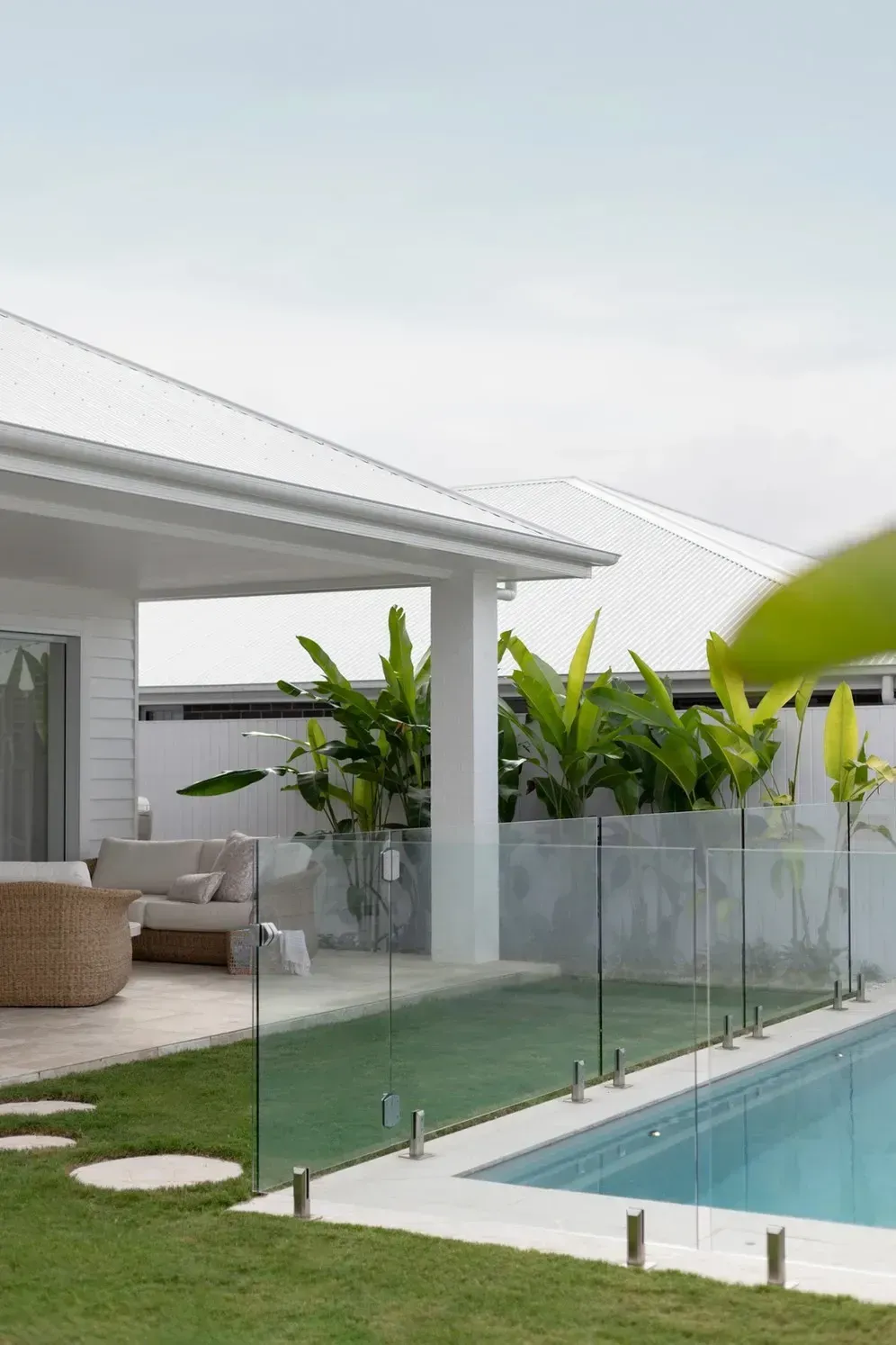 A House with A Swimming Pool in Front of It — Billabong Pool Co in Smeaton Grange, NSW