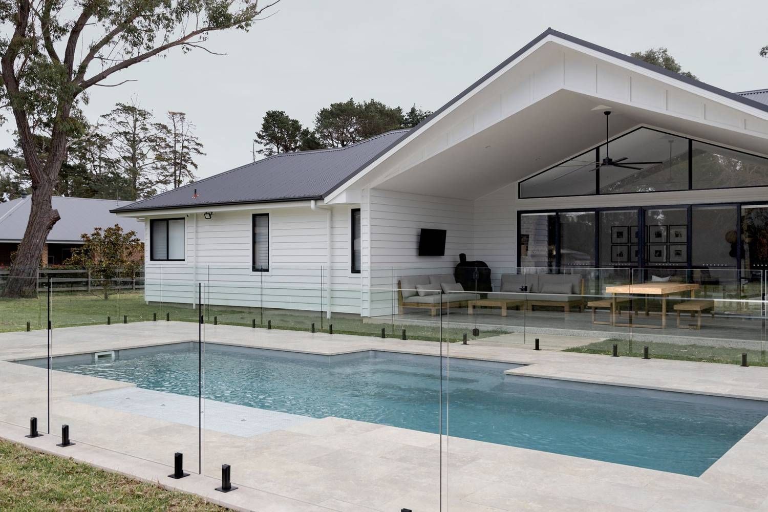 A White House with A Swimming Pool — Billabong Pool Co in Smeaton Grange, NSW