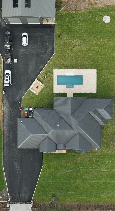 A House with A Pool in The Backyard — Billabong Pool Co in Smeaton Grange, NSW