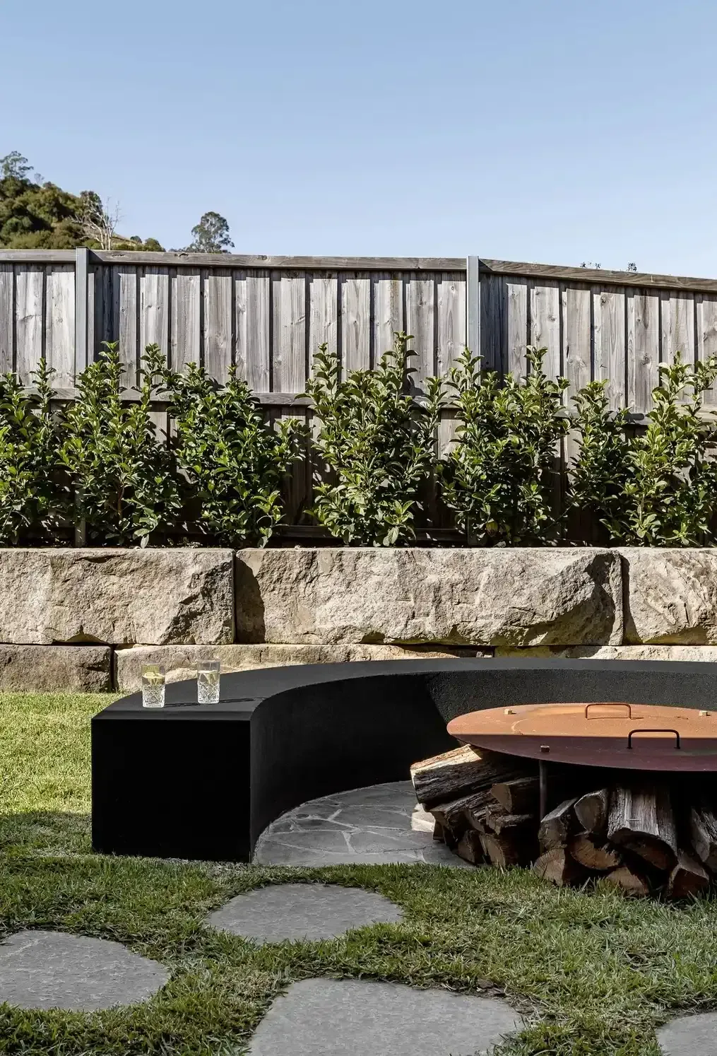 A Fire Pit in The Backyard — Billabong Pool Co in Smeaton Grange, NSW