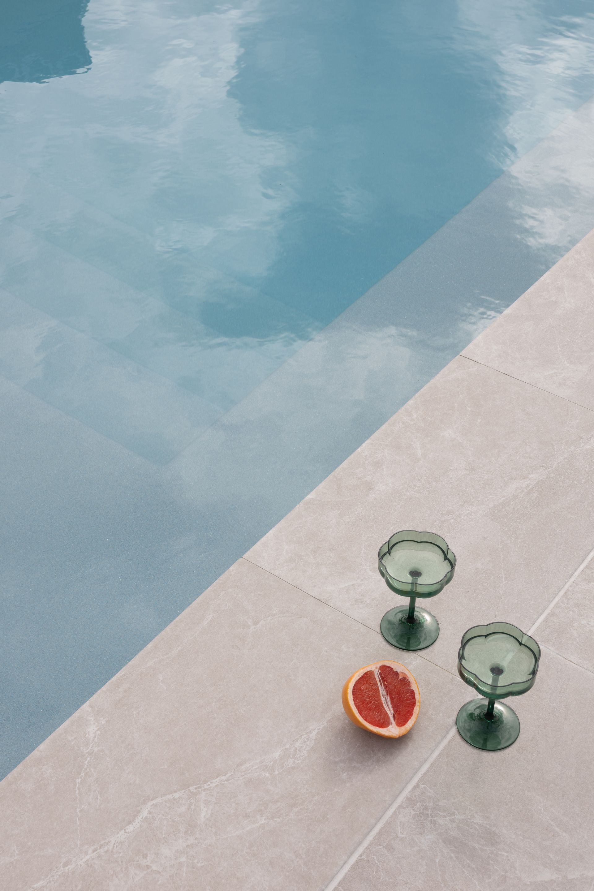 Two Glasses of Whiskey Are Sitting on A Table — Billabong Pool Co in Smeaton Grange, NSW