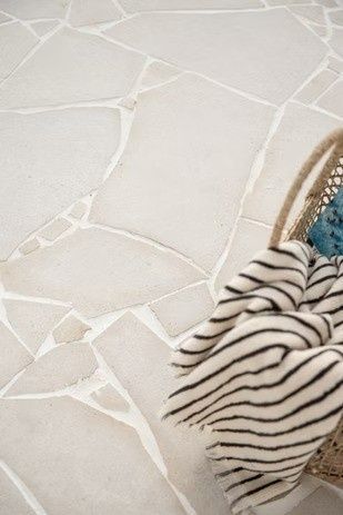 A Chair with A Striped Blanket on It — Billabong Pool Co in Smeaton Grange, NSW