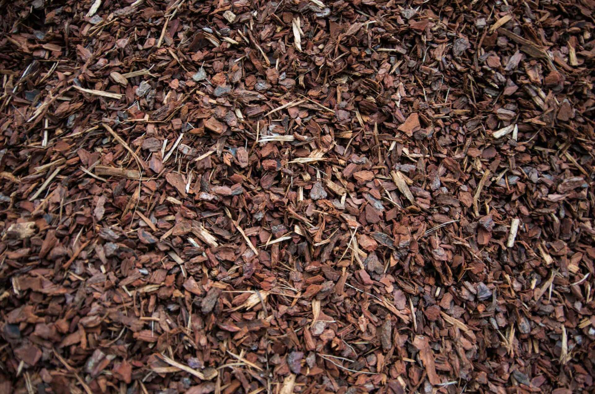 A Pile Of Wood Chips To Be Used As Landscaping Mulch - Warren, MI - Maple Lane Pest Control