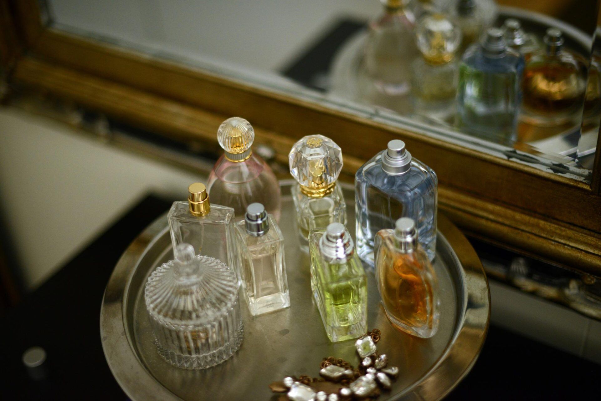 Perfume Bottles On A Tray By A Mirror - Warren, MI - Maple Lane Pest Control