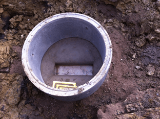 A concrete ring with a hole in the middle of it