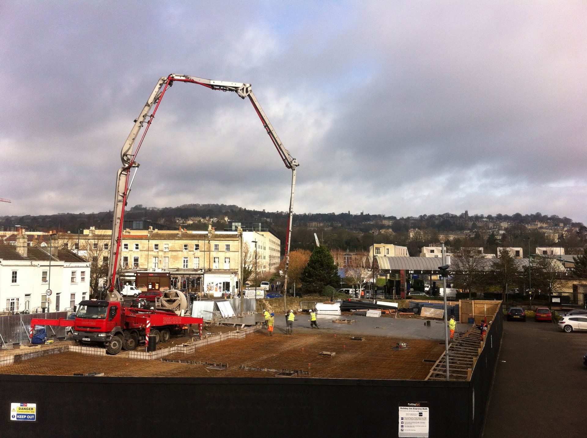 A concrete pump is being used on a construction site