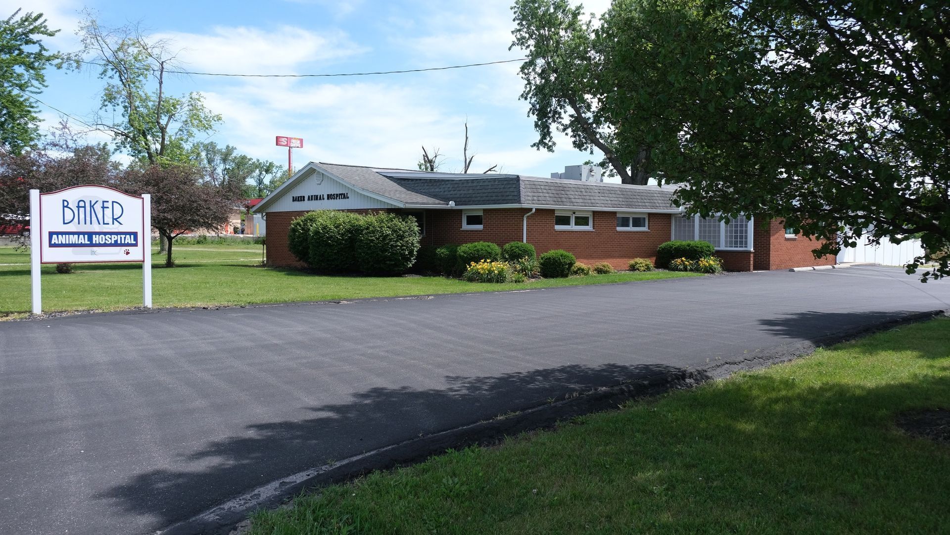 Brick building with a sign that says