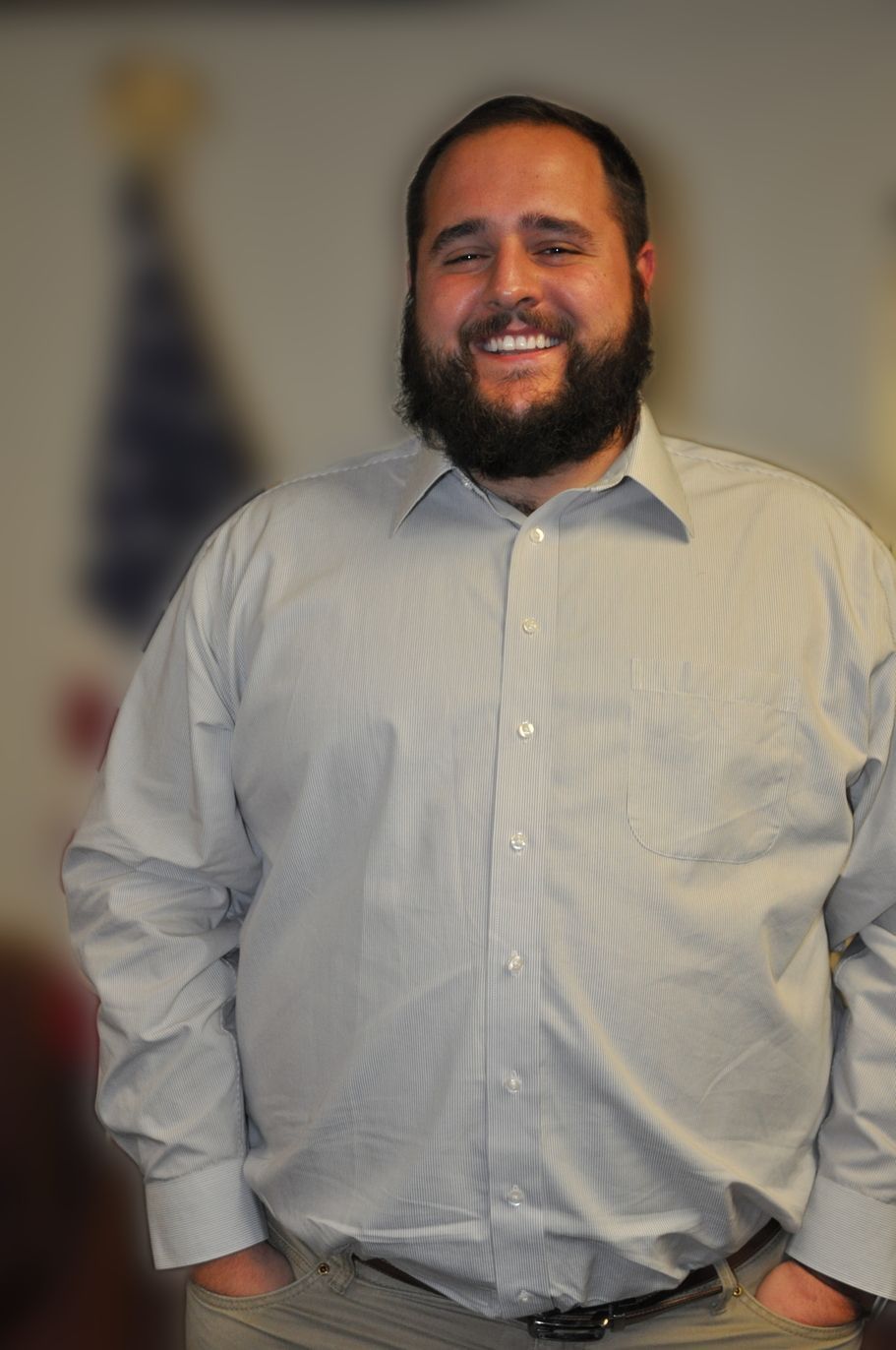 Silhouette of a person's head and shoulders; a gray, gender-neutral placeholder.
