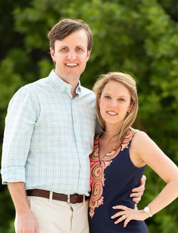 A Couple Smiling Together. Shop Wedding Registries at McAdams' Ltd., a Gift Store in Columbia, MO.