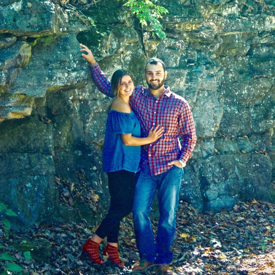 A Couple Smiling Together. Shop Wedding Registries at McAdams' Ltd., a Gift Store in Columbia, MO.