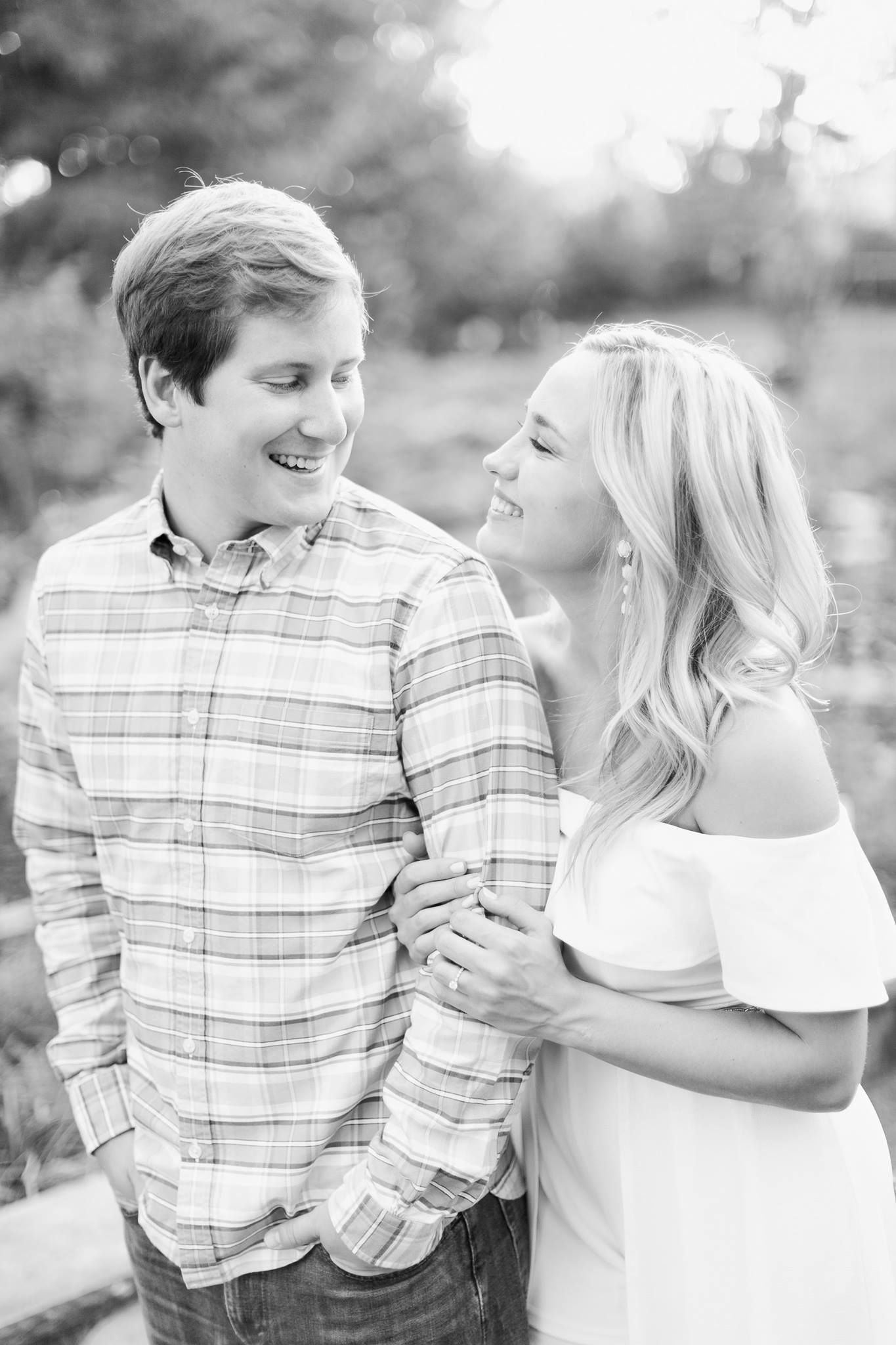 A Couple Smiling Together. Shop Wedding Registries at McAdams' Ltd., a Gift Store in Columbia, MO.