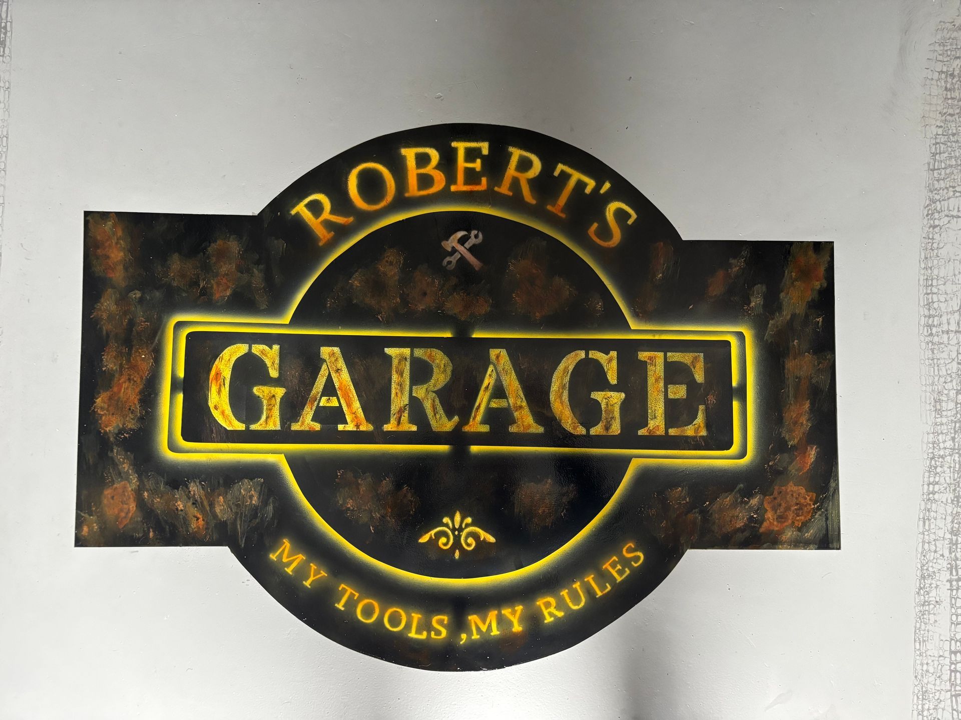 Garagebord in vintage-stijl met de tekst 