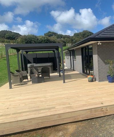 Wooden Deck With Chairs And Table — Auckland, NZ — Serenity Landscapes