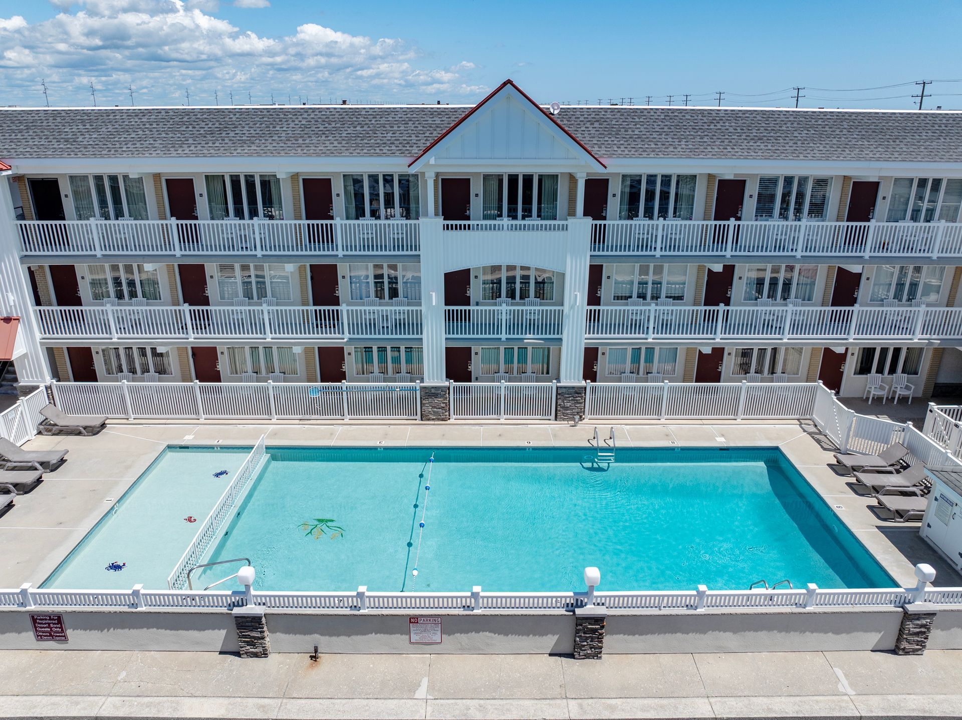 aerial image of hotel and pool
