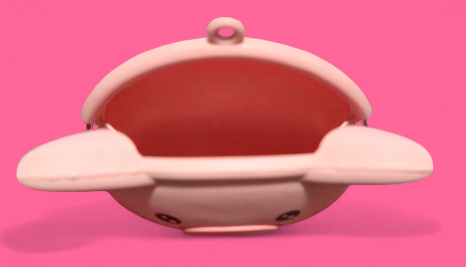 Monedero de chanchito rosado